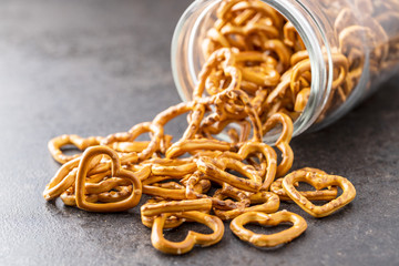 Crispy pretzels shape heart. Tasty snack.