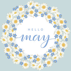 chamomile and forget me-not-flowers round frame with text