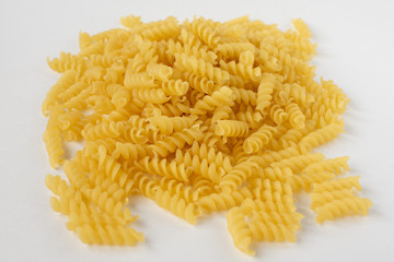 Italian spiral macaroni macaroni raw food , background.