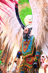a huehue mask as clown character is a very popular character in the mexican carnival