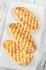 Grilled chicken on serving plate