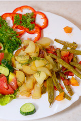 ifferent vegetables on a white plate, veggie dish on a white plate