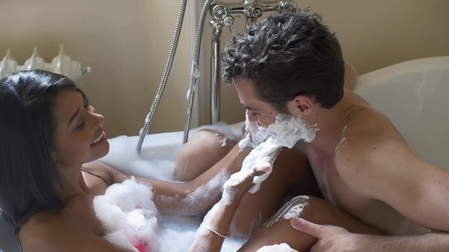 Happy couple spending time at home. Lifestyle moments in their house during the weekend