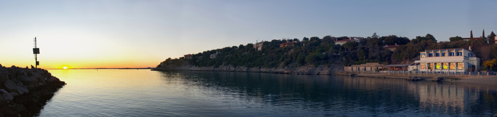 Fototapeta na wymiar Panorama shot of the Duino Harbour - Trieste - Friuli Venezia Giulia - Italy Ver. 1