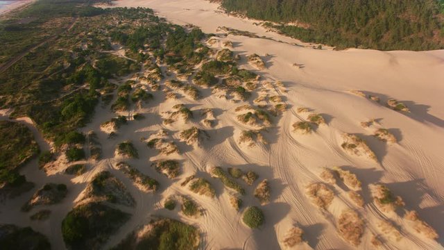 Oregon Coast circa-2019.  Aerial view of sand dunes on Oregon Coast.  Shot from helicopter with cineflex gimal and RED 8K camera.