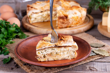 Savory puff pastry, spanakopita, Greek pie with cheese filling