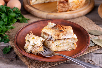 Homemade pie with cheese and herbs