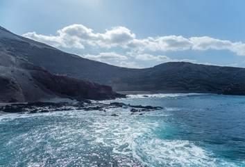 The surf on volcanic black beach El Golfo, island Lanzarote