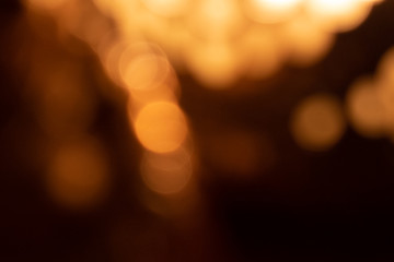 abstract glowing bokeh lights on dark background