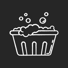 Handwash chalk white icon on black background. Soaking laundry, wash basin with foam, hand washing. Delicate fabric wash, stain removal, garment care. Isolated vector chalkboard illustration