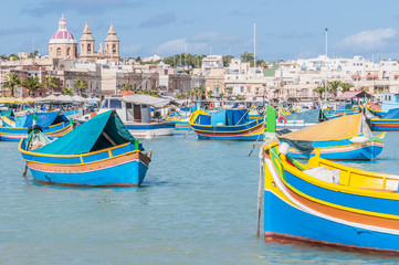 Fototapeta na wymiar Harbor of Marsaxlokk, a fishing village in Malta.