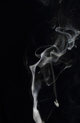 Abstract white smoke texture on black background