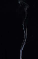 Abstract white smoke texture on black background