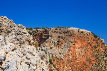 Fototapeta na wymiar Rocks and the medieval fortress of Alanya, Turkey