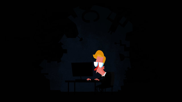 Man working in his cave on a computer