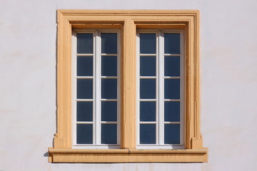 Renaissance double window frame at the Amtshaus building facade in the old town of Trier Pfalzel in Germany