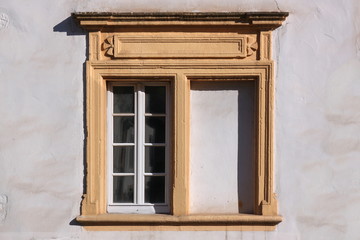 Renaissance twin frame with blind window at the Amtshaus building facade in the old town of Trier...