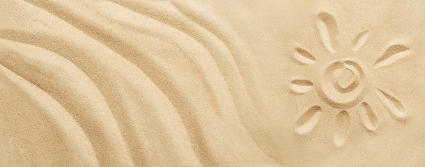 Naklejka na ściany i meble Tropical sand background with sand waves and sun. Sandy beach texture with copy space. Top view