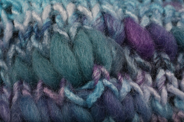Blue and Pink knitted background texture. Handmade hobby crafts concept. Close up.