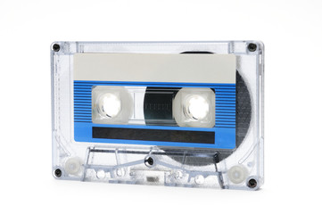 Compact audio tapes for magnetic recording on a white background.Compact cassettte