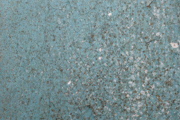 Old painted wall with cracked paint