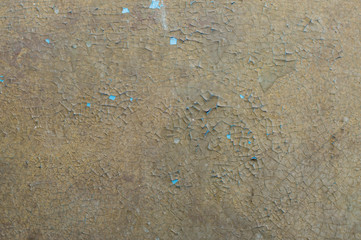 Old painted wall with cracked paint
