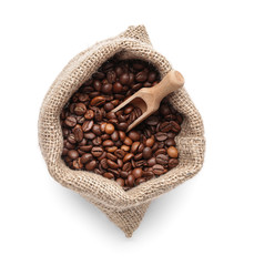 Bag with coffee beans on white background