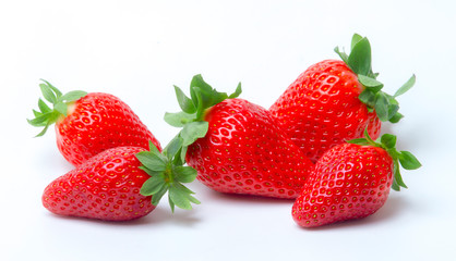 Strawberries with strawberry leaf on white background