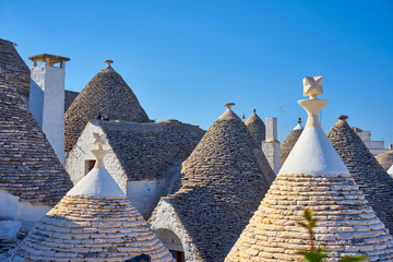 Roofs Of Alberobello Apulia Italy With Typical Architecture At Sunset
