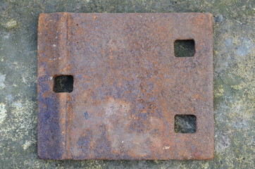 Old rusty railway lining as a background.