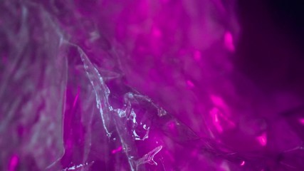 Cool background Loop of Holographic neon texture. Vibrant aqua menthe color with motion. Abstract Foil Texture Animation. Moving multi-color light Live wallpaper.Stop motion animation