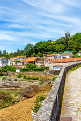 Fototapeta na wymiar A Ponte Maceira view from the bridge in A Coruna Province, Galicia, Spain on the Fisterra-Muxia Way of St. James