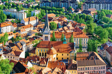 Fototapeta na wymiar St James Church and cityscape in Ljubljana Slovenia