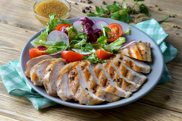 grilled chicken fillet with vegetable salad