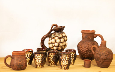 Souvenir from Moldova - Ceramic jugs and cups. On white background