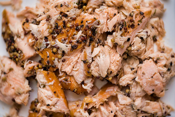 rustic smoked salmon flakes food background blur defocused