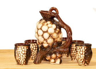 Souvenir from Moldova - Ceramic jugs and cups. On white background