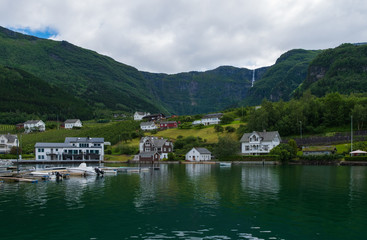 Fototapeta na wymiar Norway fiord Ullensvang village - part of Hardanger Fjord called Sorfjord. Morning view. July 2019
