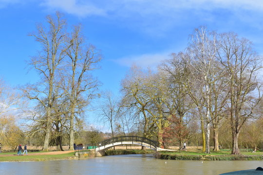 The Thames river or Isis as known here between Folly Bridge in Oxford and Iffley Boathouse walk joins Christ church meadow trail Part of the river famed for rowing Sunny day in the British countryside