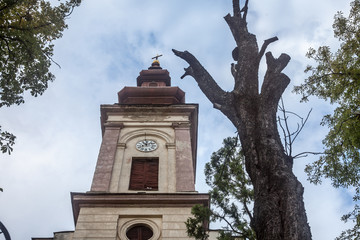 Serbian orthodox Church of Uljma, a 19th century old Austro Hungarian style church, with its typical baroque clocktower. Uljma is a small rural village of the Serbia province of Voivodina