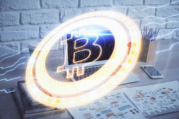 Double exposure of blockchain theme hologram and table with computer background. Concept of bitcoin...