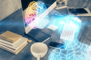 Computer on desktop with AR theme icon. Multi exposure. Concept of augmented reality.