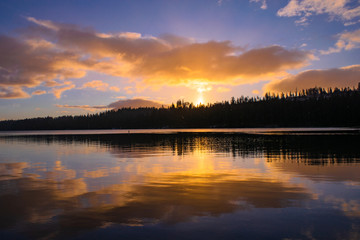 colorful sunrise on a calm lake