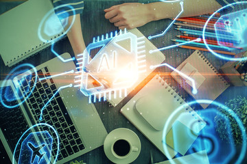 Double exposure of hands making notes with digital coding icons. Computer learning concept.