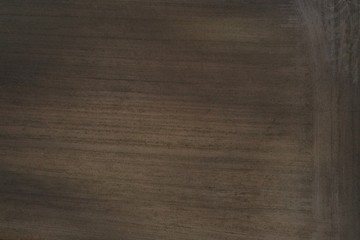 A large variety of brown grades at a field that has been plowed and is ready to be sowed in early spring