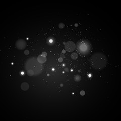 Lights bokeh on a black background. Glares with glowing particles. White light effect. Vector illustration