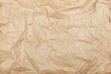 White crumpled paper texture background or cardboard surface. 