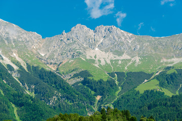 Fototapeta na wymiar View at snow mountains in Innsbruck, Austria.
