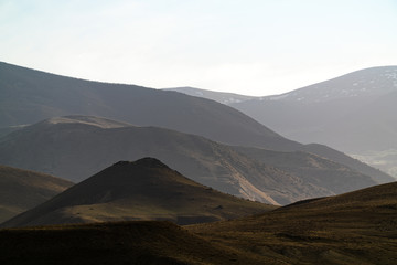 Mountain ridge terrain in haze landscape