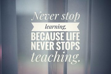 Inspirational quote - Never stop learning. Because life never stops teaching. With white background...